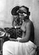 Tunisia: A young Tunisian woman, naked from the waist upwards, Lehnert & Landrock, c. 1920